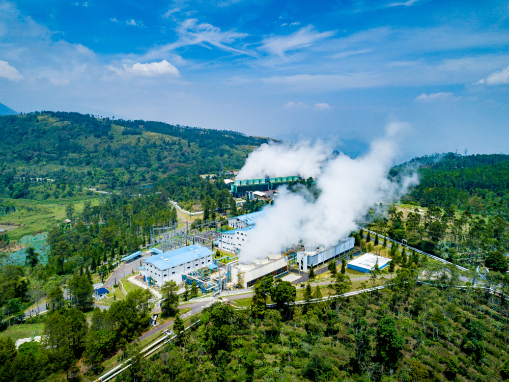 Aerial view of a geothermal energy plant in operation in Indonesia.